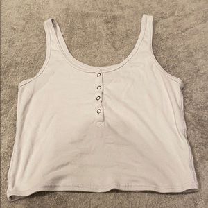 A white button tank